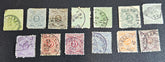 Vintage German postage stamps from Wurttemberg arranged in two rows on a black background. 