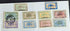 A collection of vintage French Cameroon stamps displayed on a surface, featuring various colors and designs.