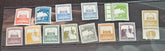 A collection of vintage Palestine postage stamps from 1918-1921 with various designs and colors, displayed in a row.