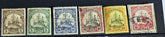 German colonial history with our collection of vintage stamps covering various colonies. 