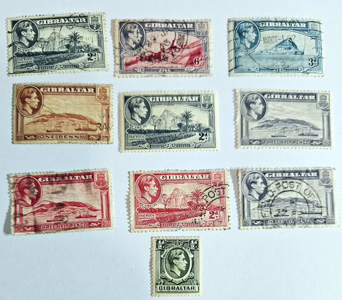 A collection of vintage Gibraltar stamps featuring various designs, colors, and themes, laid out on a white background.