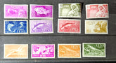 Collection of vintage stamps with different designs and colors on a black background