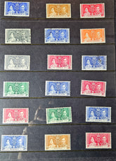 Collection of vintage stamps with portrait designs on a black background