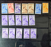 Collection of vintage stamps on a black album page