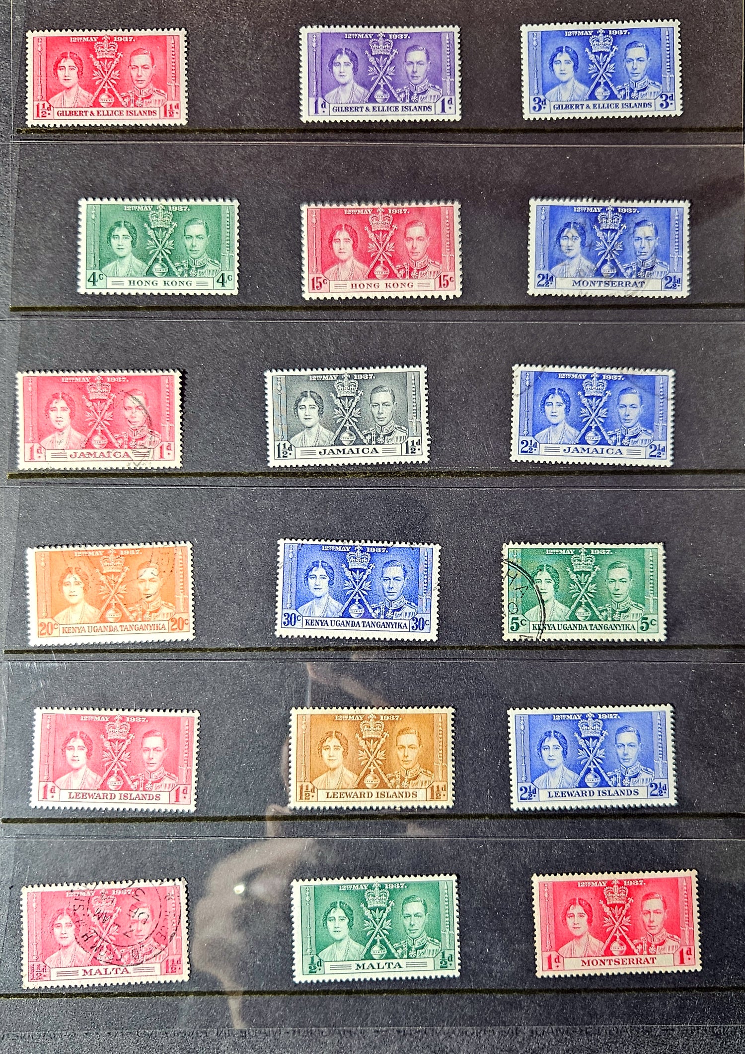 Collection of vintage stamps with colorful designs on a black background