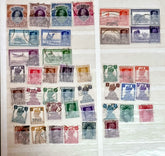A selection of vintage India stamps from various regions and periods, displayed in a row.