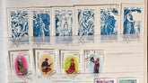 A collection of postage stamps from Kyrgyzstan showcasing various designs including cultural symbols and landscapes.