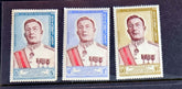 A set of vintage postage stamps from Laos featuring images of historical figures, traditional art, and natural beauty.