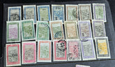 A set of vintage stamps from French Madagascar, featuring various designs including floral patterns and portraits.