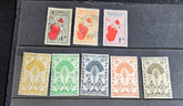 A set of vintage stamps from French Madagascar, featuring various designs including floral patterns and portraits.
