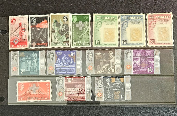 A collection of vintage postage stamps from Malta featuring various designs and colors, arranged in no specific order on a surface.