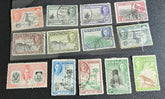 A collection of Nyasaland vintage stamps displaying various images and text, arranged in a row.