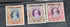 A collection of vintage Pakistan stamps from various periods, showing different designs and denominations, displayed on a glass surface.