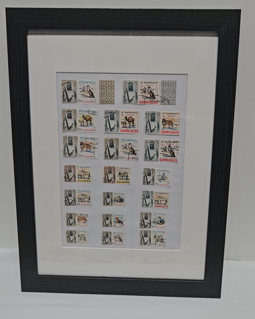 Fujairah Themed Vintage Stamp Collection in a photo frame