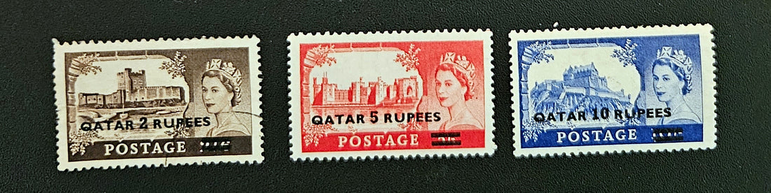 Three vintage postage stamps featuring Queen Elizabeth II on a black background