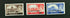 Three vintage postage stamps featuring Queen Elizabeth II on a black background