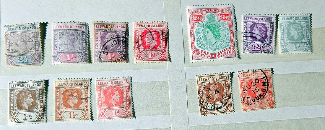 Authentic vintage Leeward Islands postage stamps archive featuring various royal eras by StampArtefact.