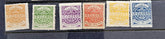 Six vintage British Samoa Empire Express postage stamps in different colors (orange, green, purple, red-orange, yellow, and blue) aligned horizontally on a dark background.