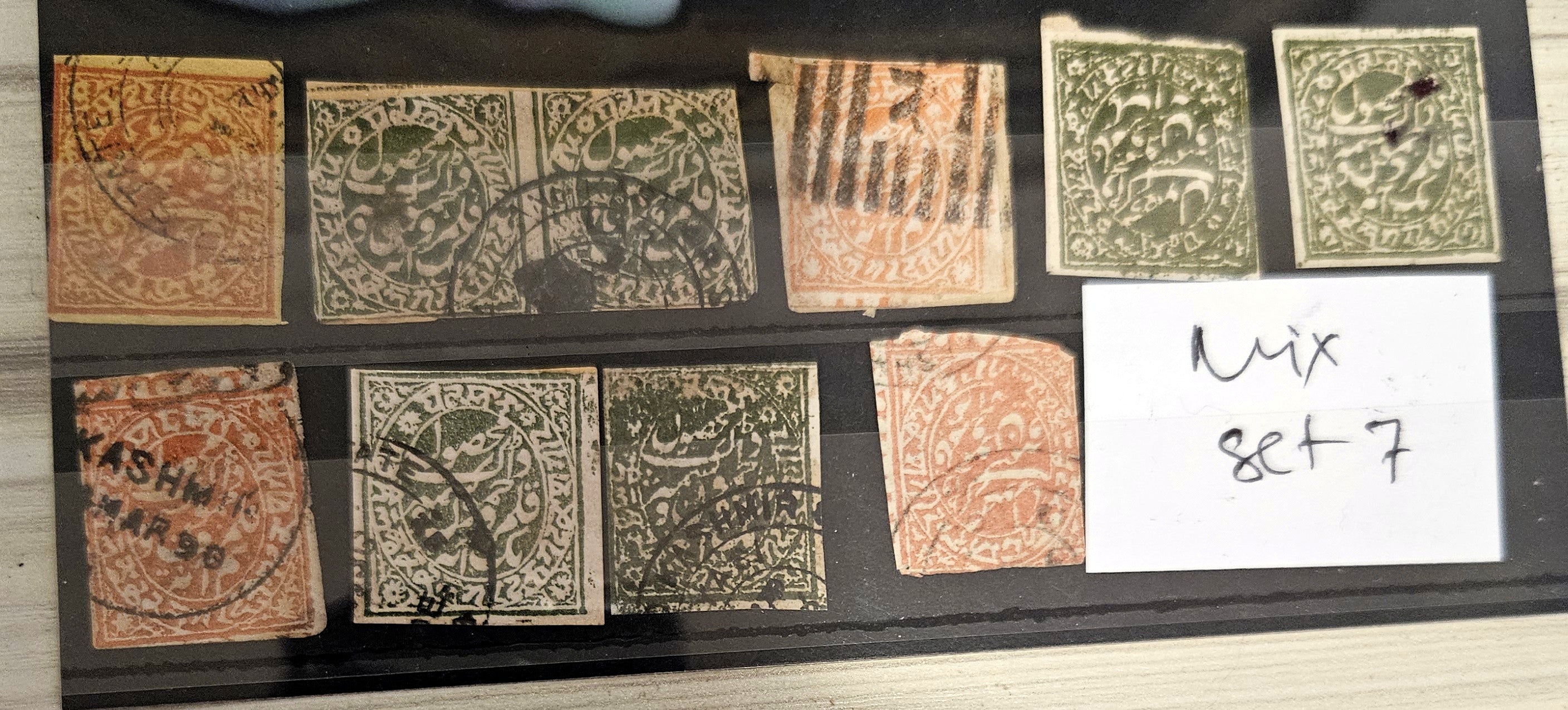 A display of various vintage Jammu and Kashmir postage stamps, with and without gum, arranged in a grid pattern.