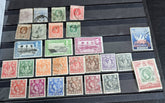 A collection of St. Lucia vintage stamps from various eras, displayed on a flat surface.