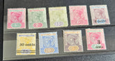 A collection of vintage Seychelles postage stamps displayed in a row, featuring various colors and denominations.