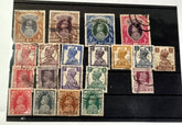 A selection of vintage India stamps from various regions and periods, displayed in a row.
