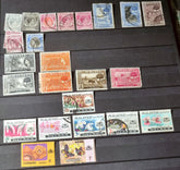 A collection of various vintage Malay state stamps 