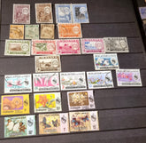 A collection of various vintage Malay state stamps 