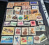 A collection of various Chinese stamps arranged in rows, showcasing different designs and colors.