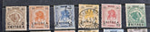 A collection of vintage Italian Eritrea postage stamps with various denominations and overprints, displayed in a row.