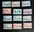 A set of vintage Falkland Islands stamps from various reigns, displayed in a row.