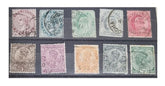 A collection of various Indian postage stamps displayed in a row, showcasing different colors and designs.
