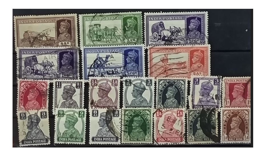 A selection of vintage India stamps from various regions and periods, displayed in a row.