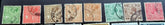 A collection of vintage postage stamps from Malta featuring various designs and colors, arranged in no specific order on a surface.