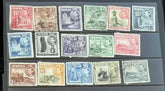 A collection of vintage postage stamps from Malta featuring various designs and colors, arranged in no specific order on a surface.