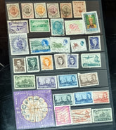A collection of various postage stamps from different Arab countries displayed in a row, each with different designs and colors.