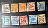 A collection of vintage Palestine postage stamps from 1918-1921 with various designs and colors, displayed in a row.