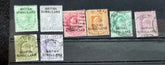 A collection of vintage Somaliland stamps displaying various national emblems and monetary denominations, arranged on a dark background.