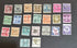 A collection of vintage USA postage stamps with various overprints and cancellations.